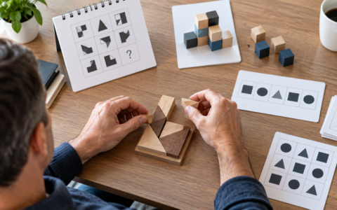 Adult completing aptitude and problem-solving exercises for career planning